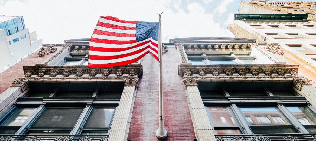 unsplash american flag on building cropped